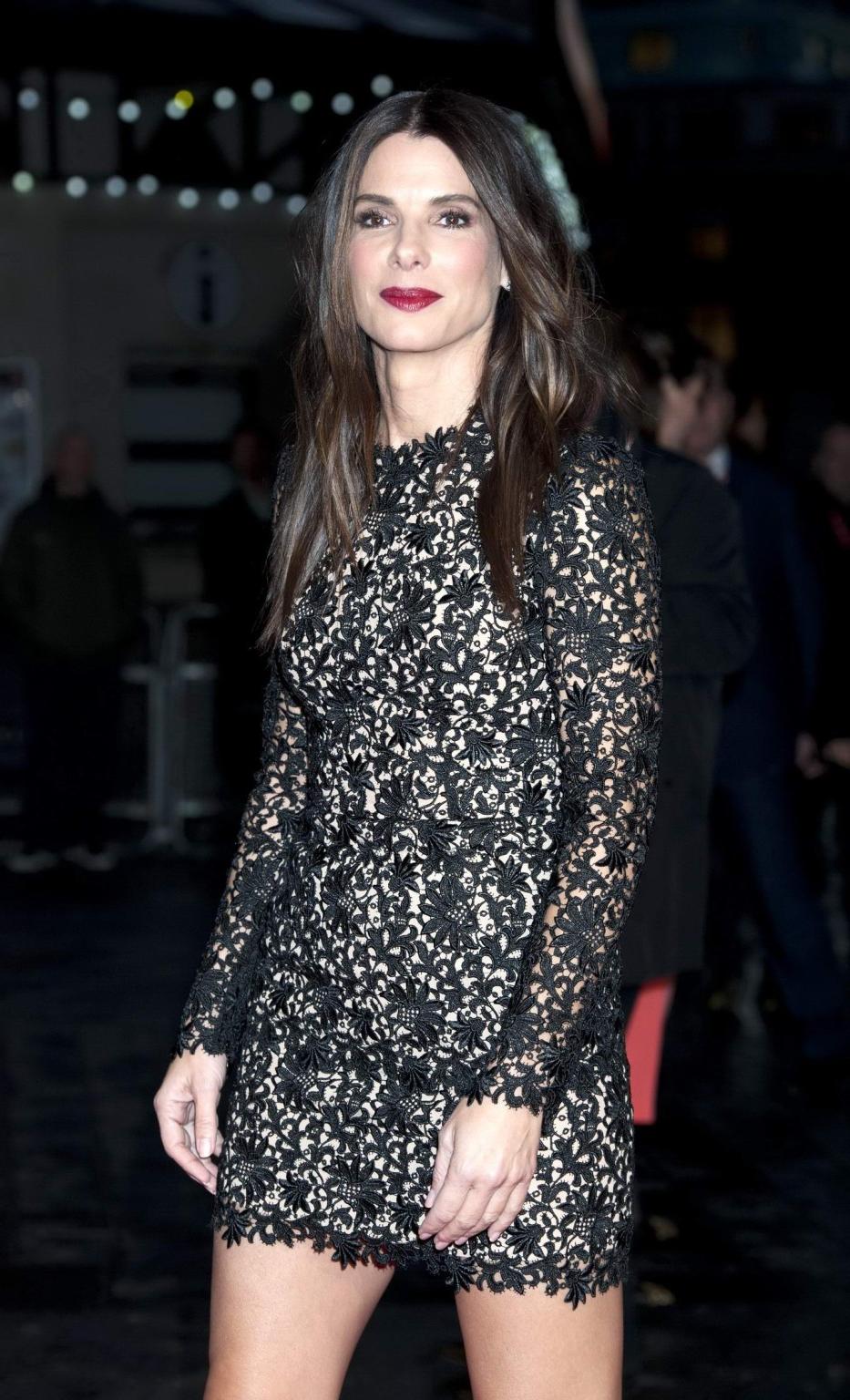 16P Sandra Bullock wearing a black lace mini dress at the 'Gravity' screening in Lon