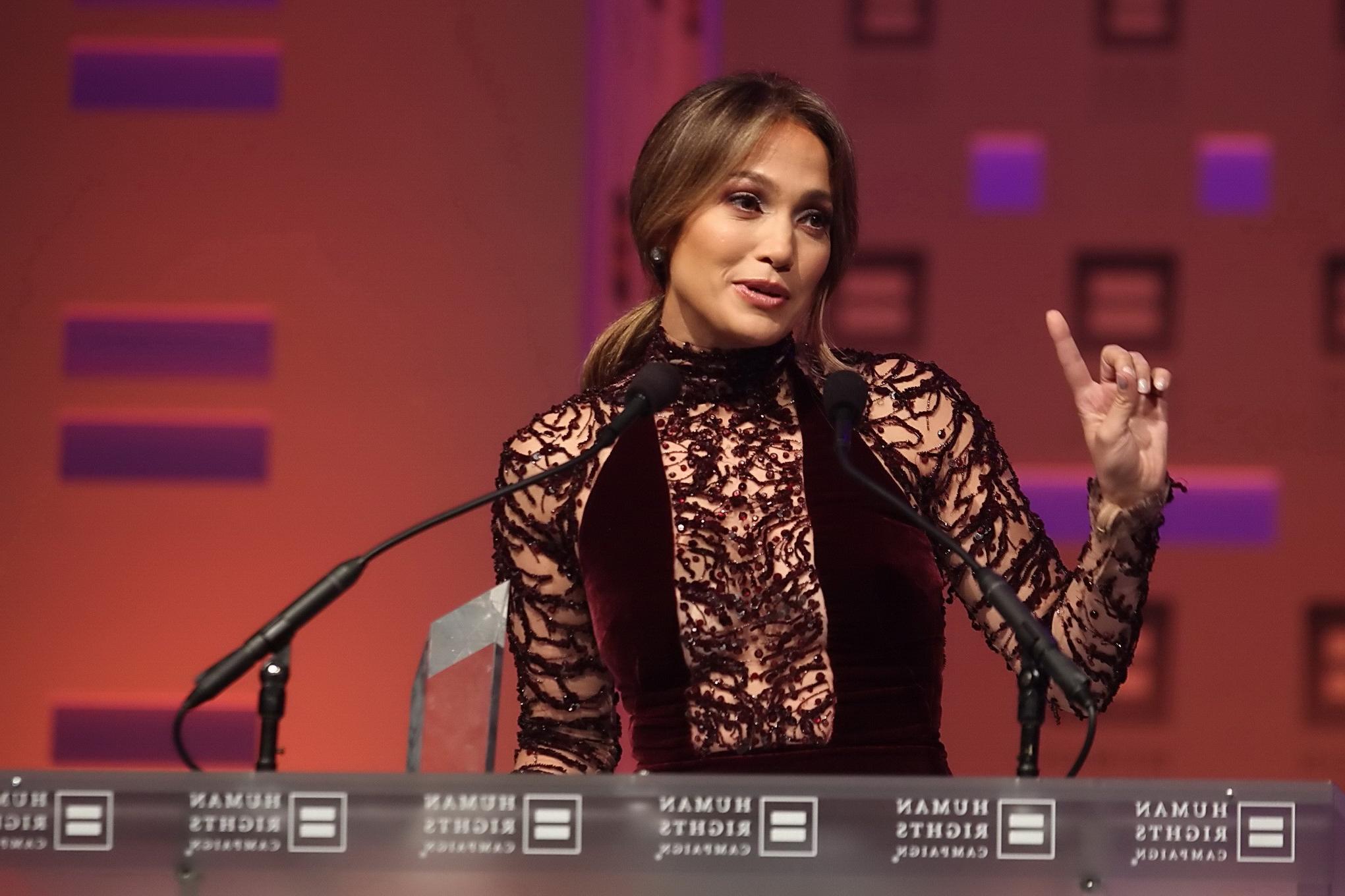 16P Jennifer Lopez braless wearing gorgeous black see-through dress at 2013 HRC Nati
