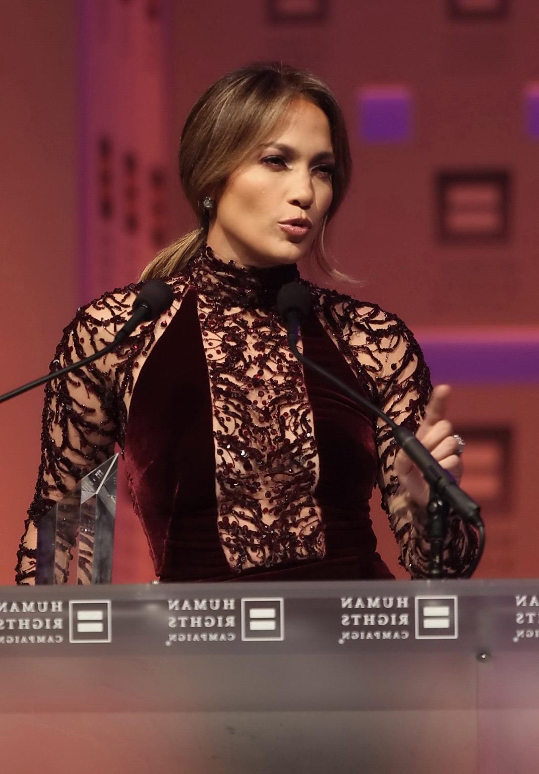16P Jennifer Lopez braless wearing gorgeous black see-through dress at 2013 HRC Nati