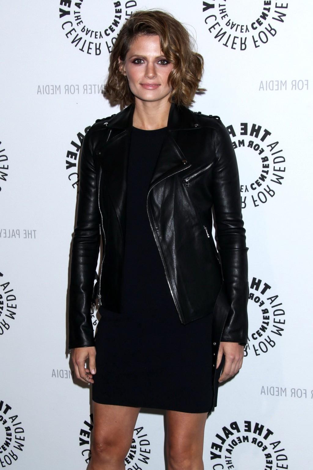 15P Stana Katic leggy wearing a black mini dress at PaleyFest 'An Evening with Castl