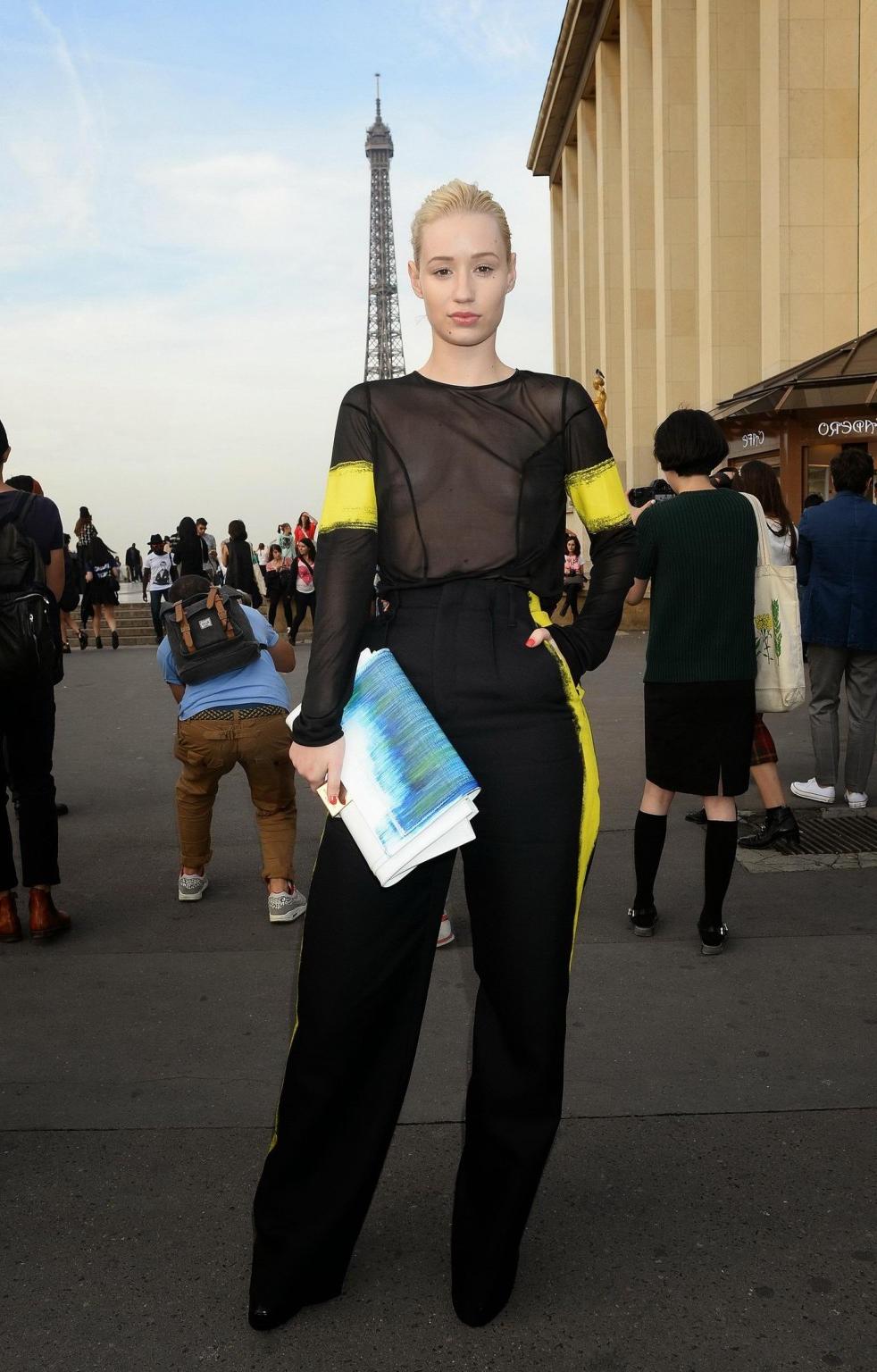 16P Iggy Azalea shows off her tits wearing a see through top at the Maison Martin Ma