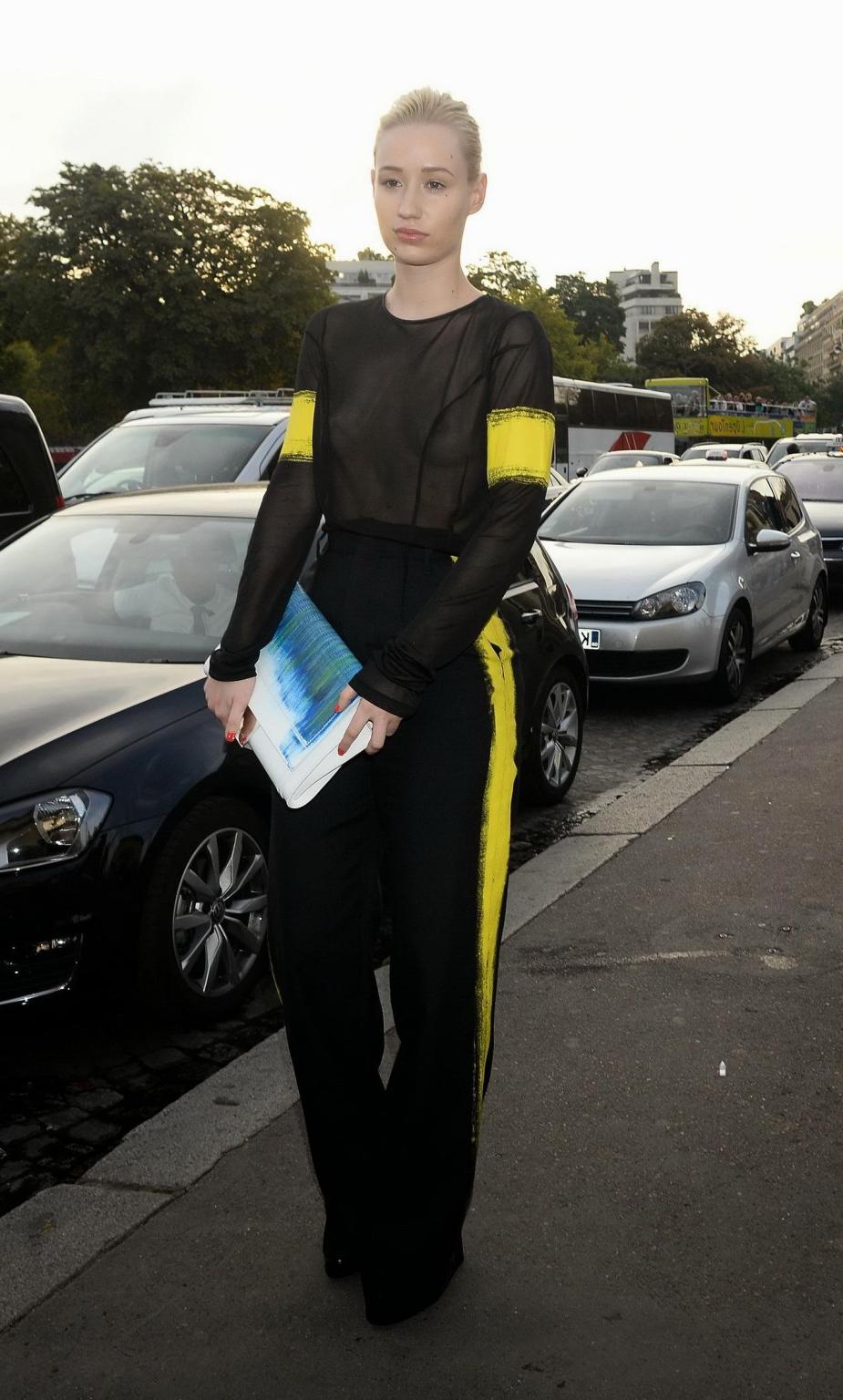 16P Iggy Azalea shows off her tits wearing a see through top at the Maison Martin Ma