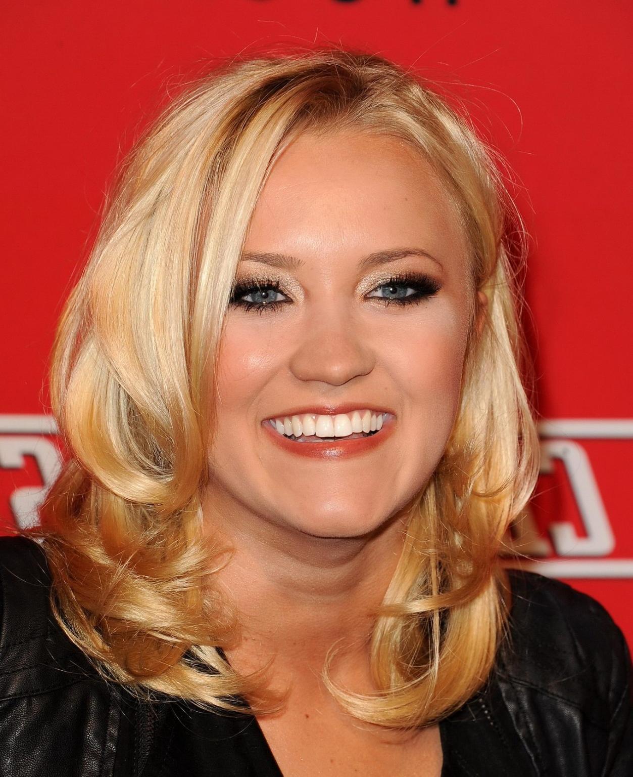 16P Emily Osment wearing black tube mini dress at the Cleaners premiere in Culver Ci