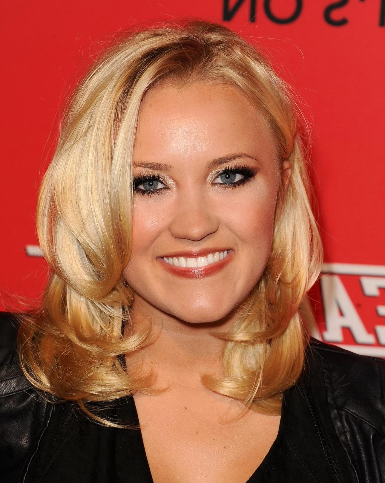 16P Emily Osment wearing black tube mini dress at the Cleaners premiere in Culver Ci