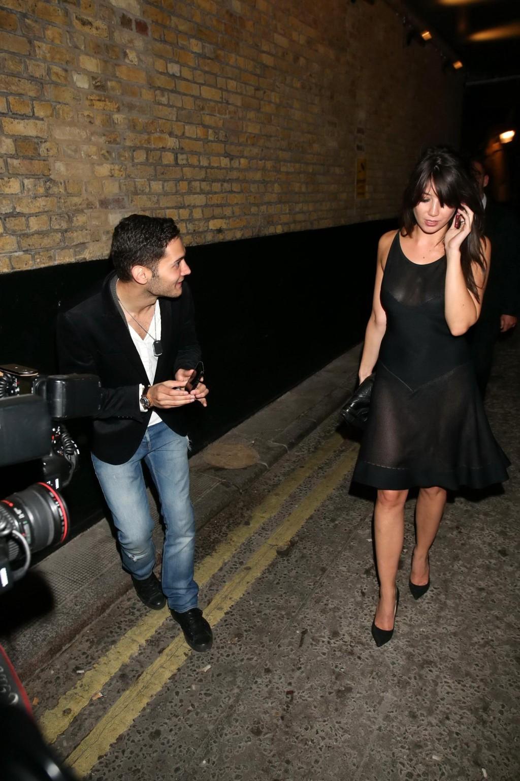 16P Daisy Lowe shows off her boobs wearing a partially see through dress at the W Ma