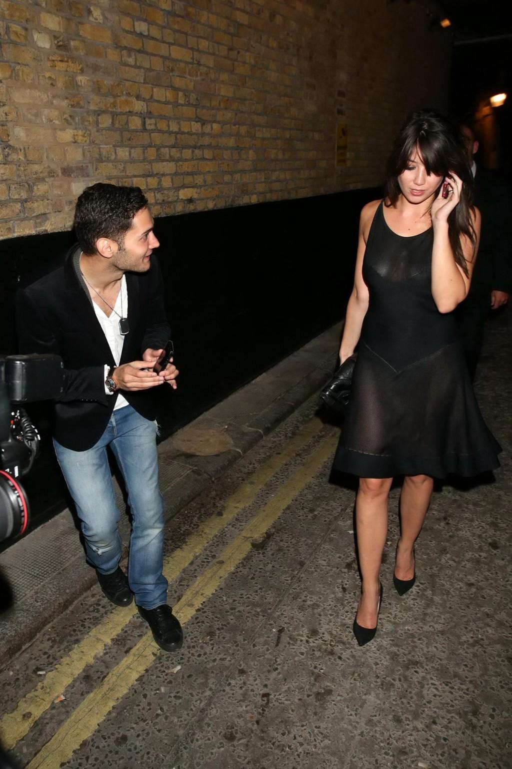 16P Daisy Lowe shows off her boobs wearing a partially see through dress at the W Ma