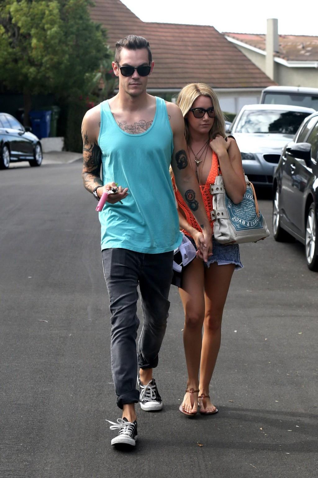 16P Ashley Tisdale wearing skimpy orange monokini and hotpants out in Los Angeles