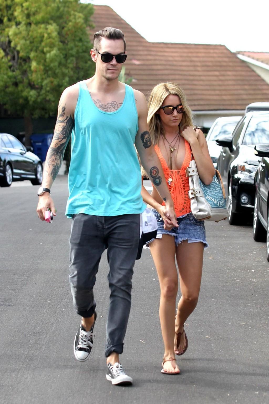 16P Ashley Tisdale wearing skimpy orange monokini and hotpants out in Los Angeles
