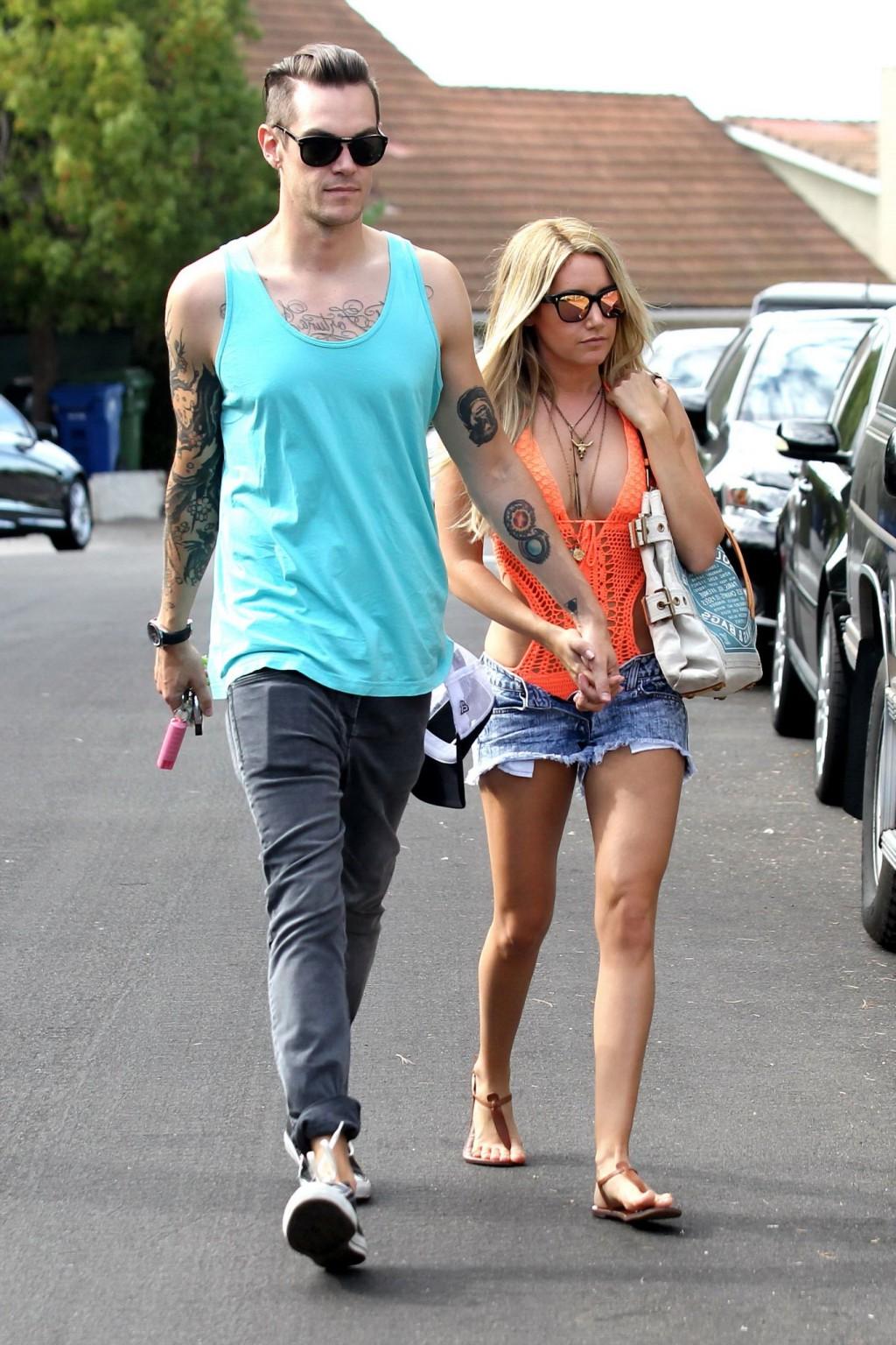 16P Ashley Tisdale wearing skimpy orange monokini and hotpants out in Los Angeles