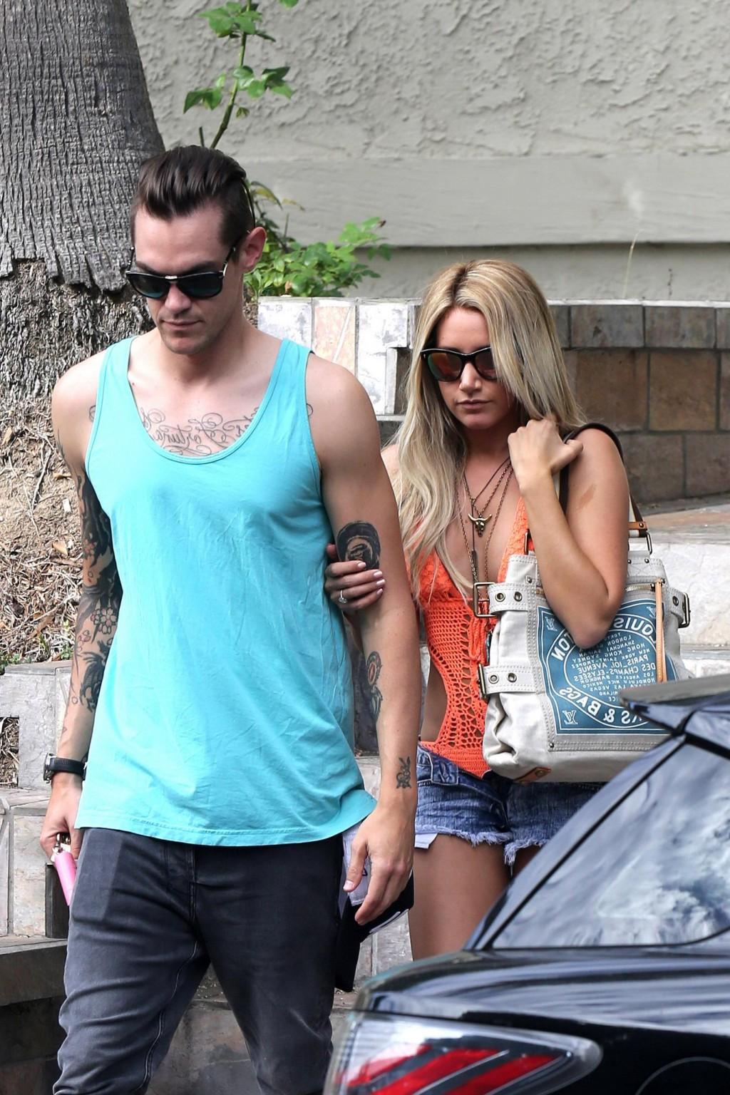 16P Ashley Tisdale wearing skimpy orange monokini and hotpants out in Los Angeles