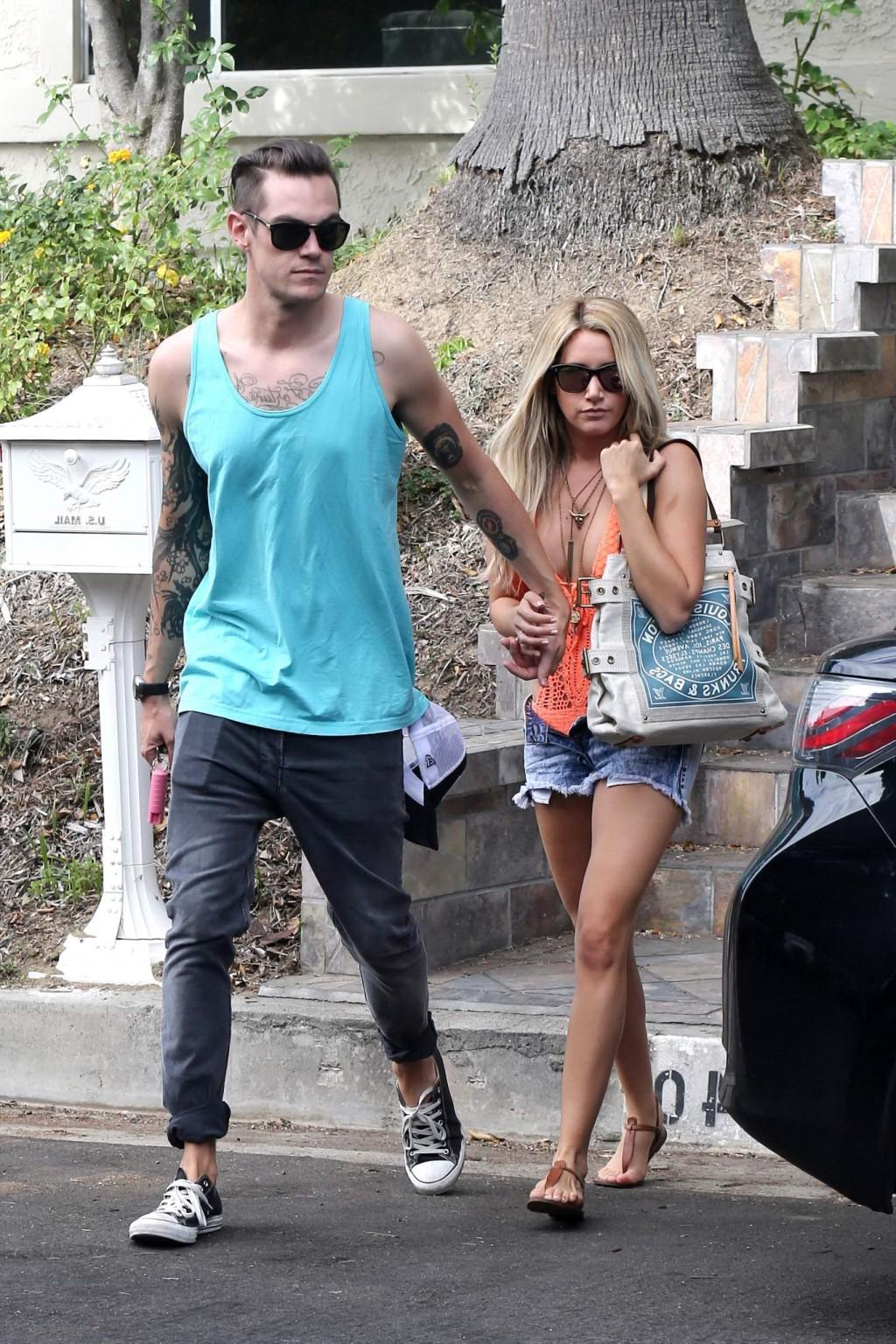 16P Ashley Tisdale wearing skimpy orange monokini and hotpants out in Los Angeles