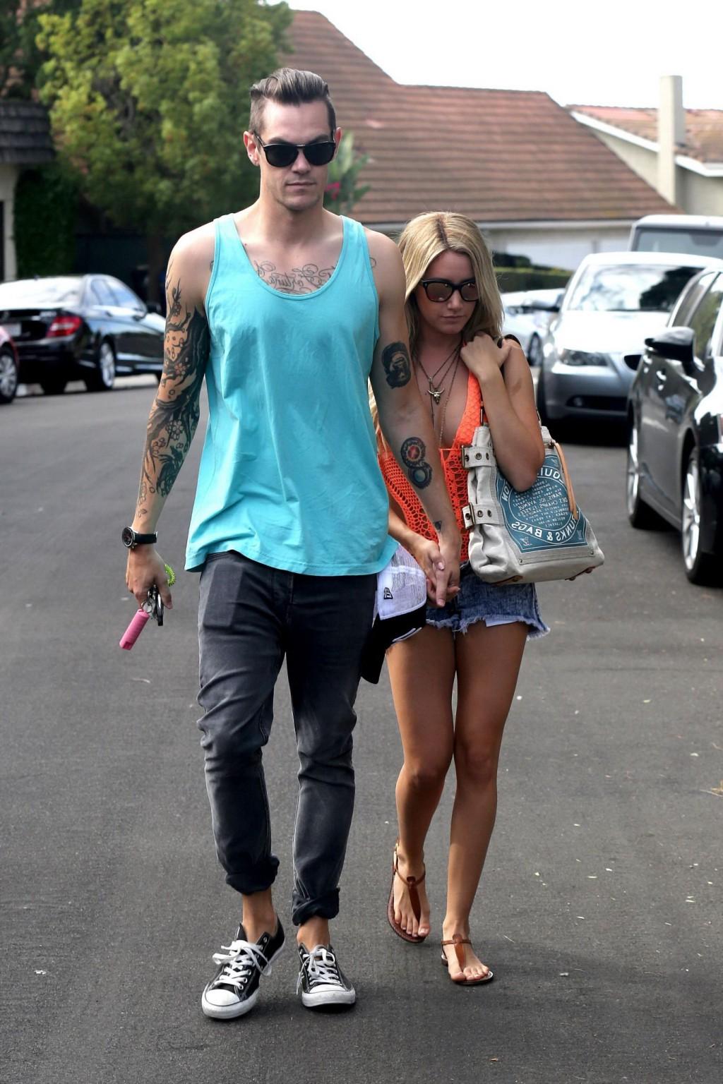 16P Ashley Tisdale wearing skimpy orange monokini and hotpants out in Los Angeles
