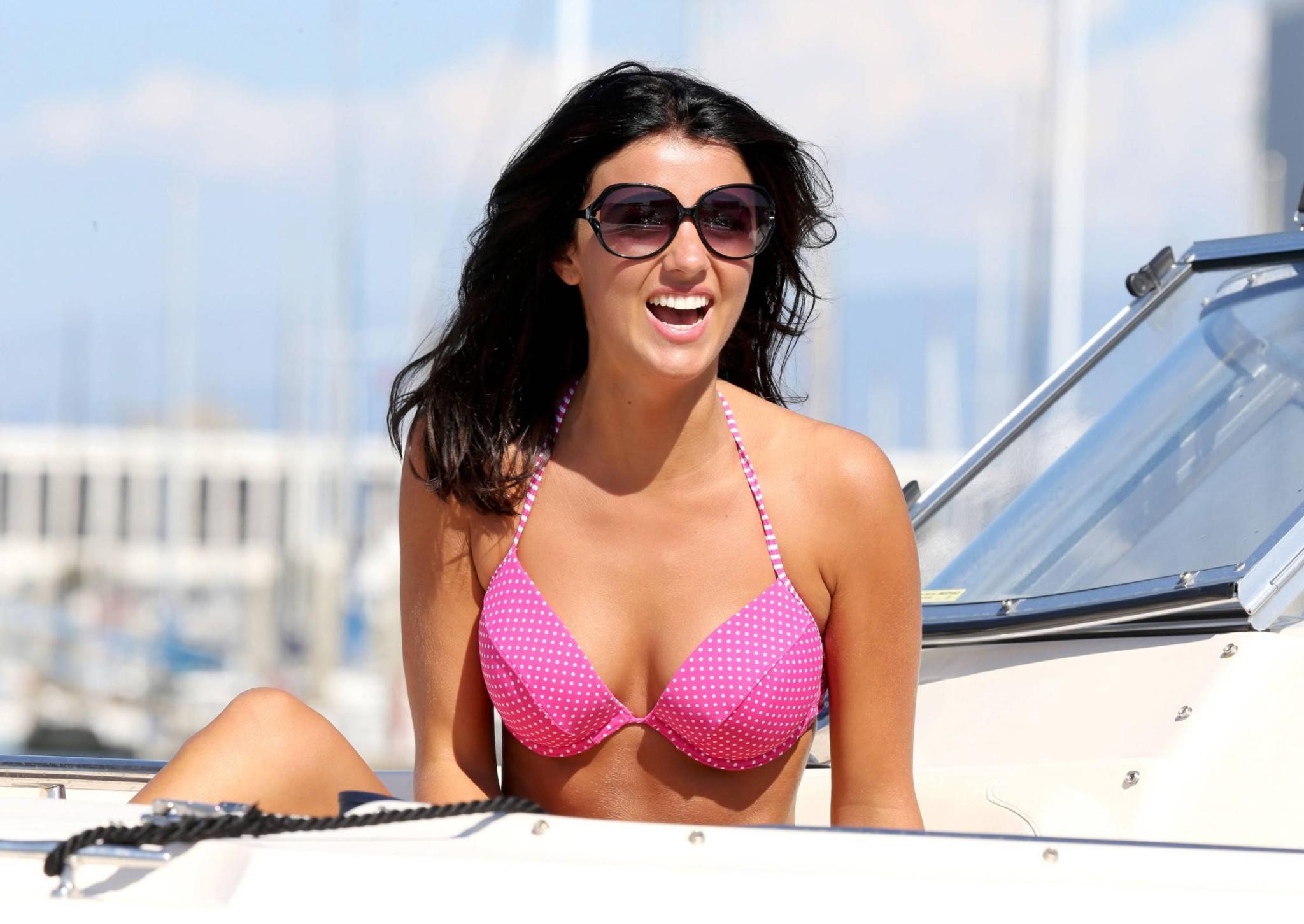 16P Lucy Mecklenburgh wearing pink polka dot bikini fights with a bottle of Moet at 