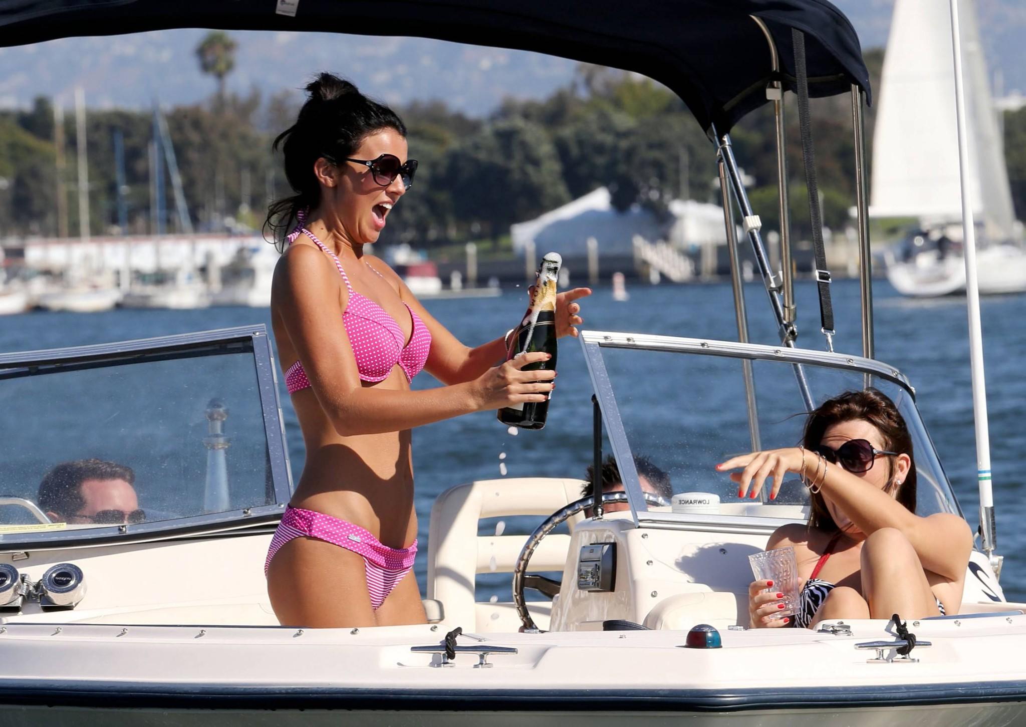 16P Lucy Mecklenburgh wearing pink polka dot bikini fights with a bottle of Moet at 