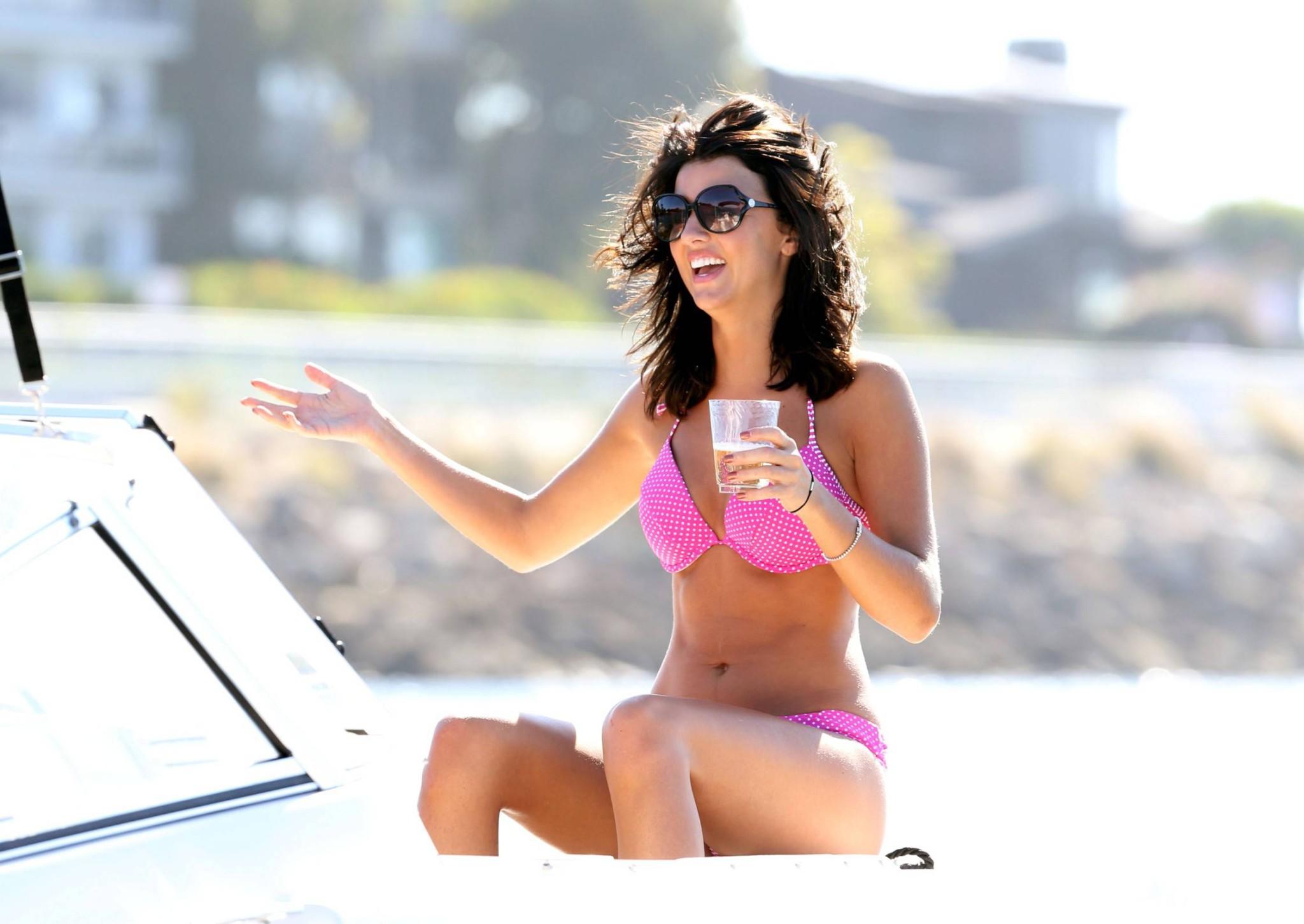 16P Lucy Mecklenburgh wearing pink polka dot bikini fights with a bottle of Moet at 