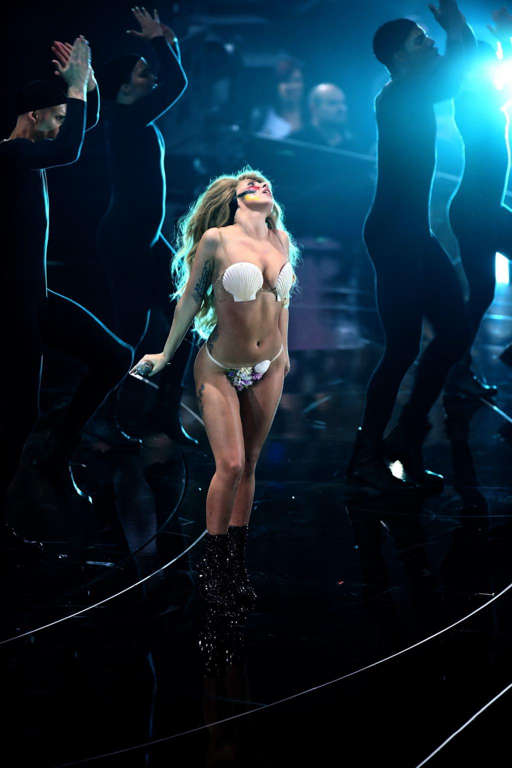 16P Lady Gaga shows off her ass  boobs in skimpy shell fish costume at the 2013 MTV 
