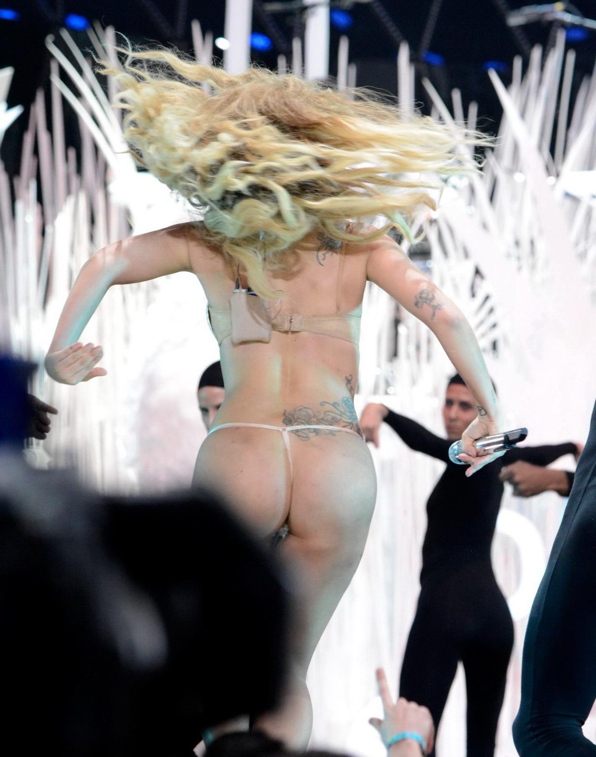 16P Lady Gaga shows off her ass  boobs in skimpy shell fish costume at the 2013 MTV 