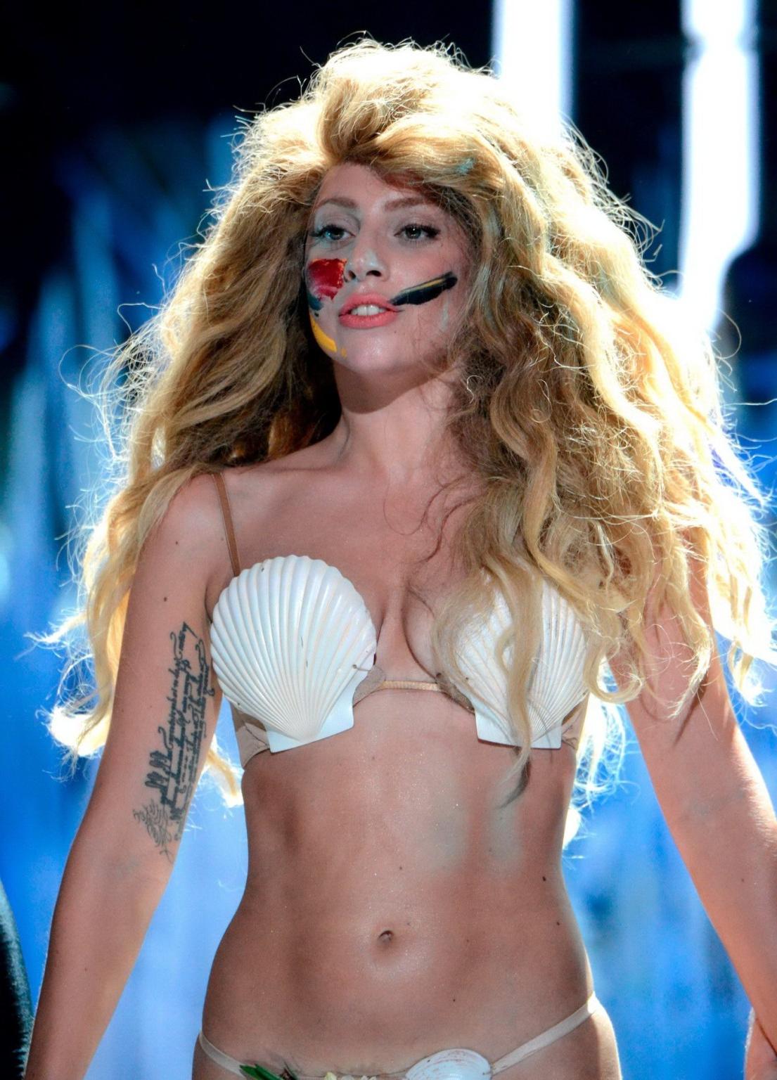 16P Lady Gaga shows off her ass  boobs in skimpy shell fish costume at the 2013 MTV 