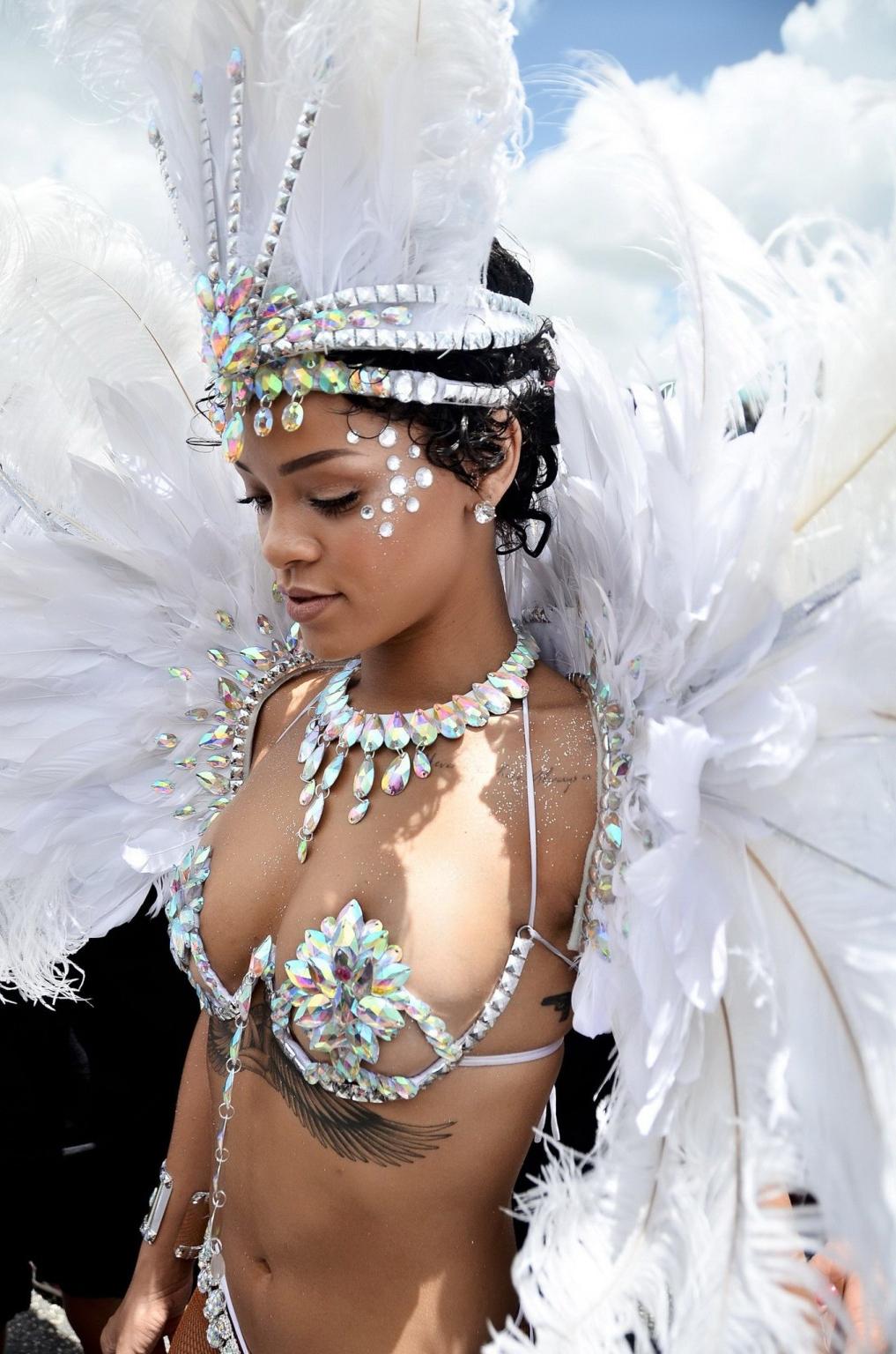16P Rihanna wearing tiny carnival costume at Kadooment Day Parade in Barbados