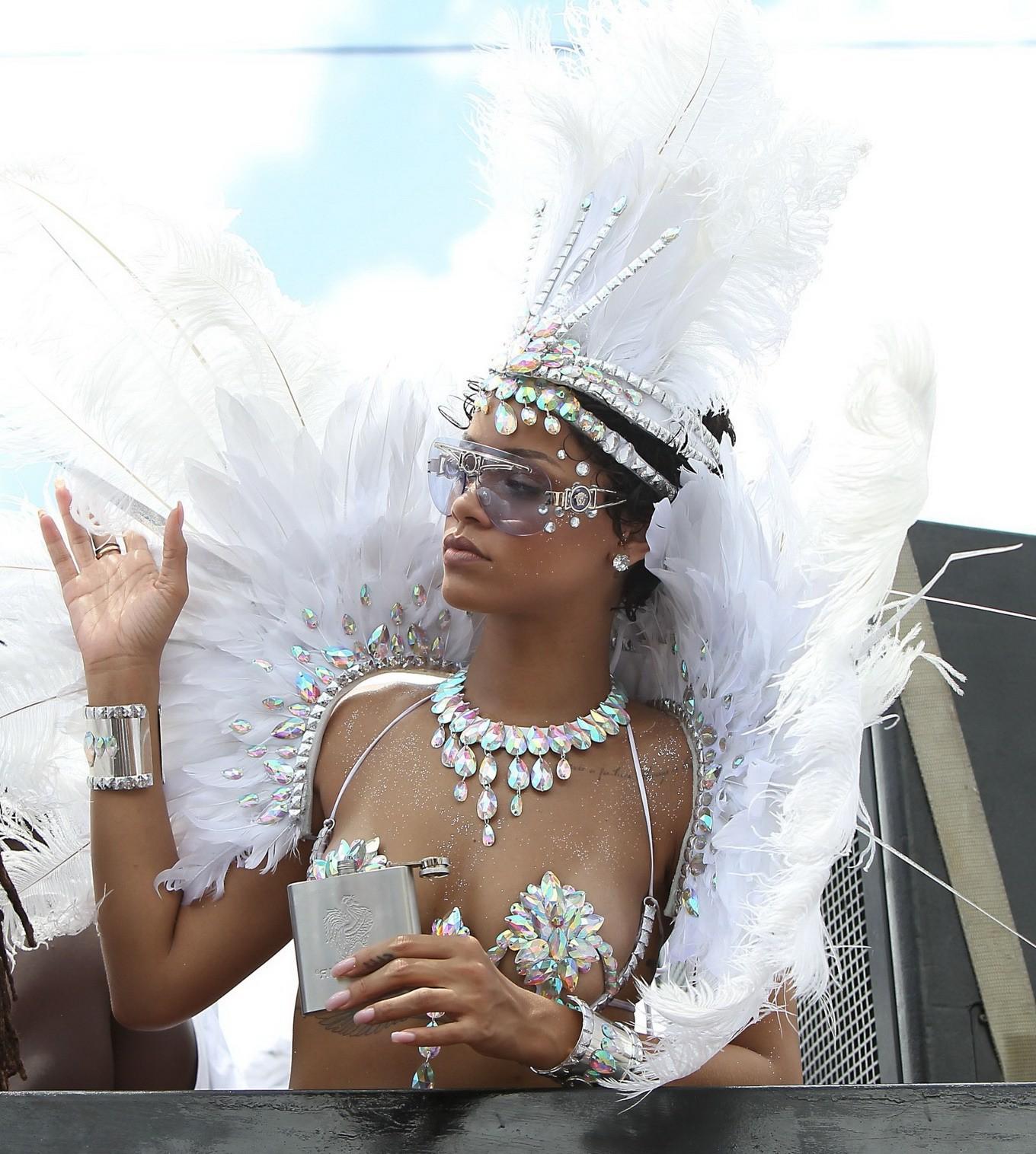 16P Rihanna wearing tiny carnival costume at Kadooment Day Parade in Barbados
