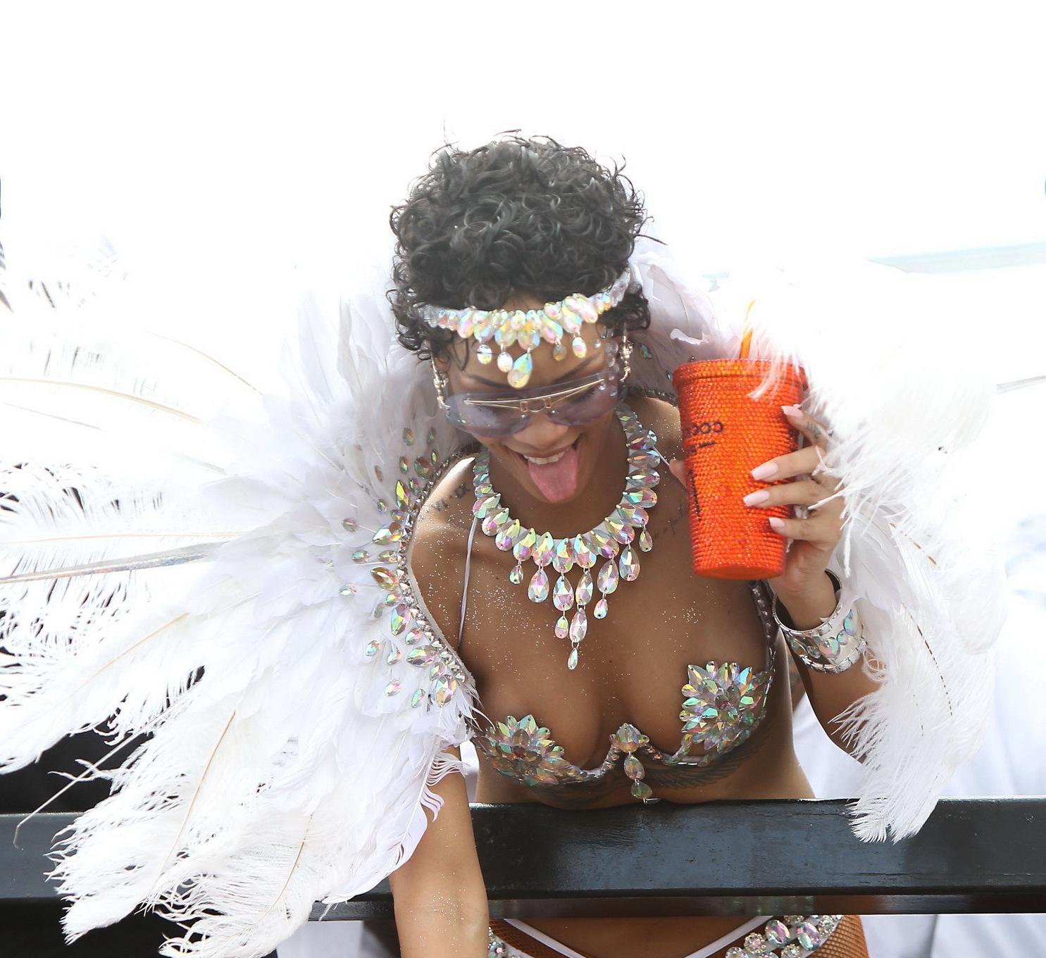 16P Rihanna wearing tiny carnival costume at Kadooment Day Parade in Barbados