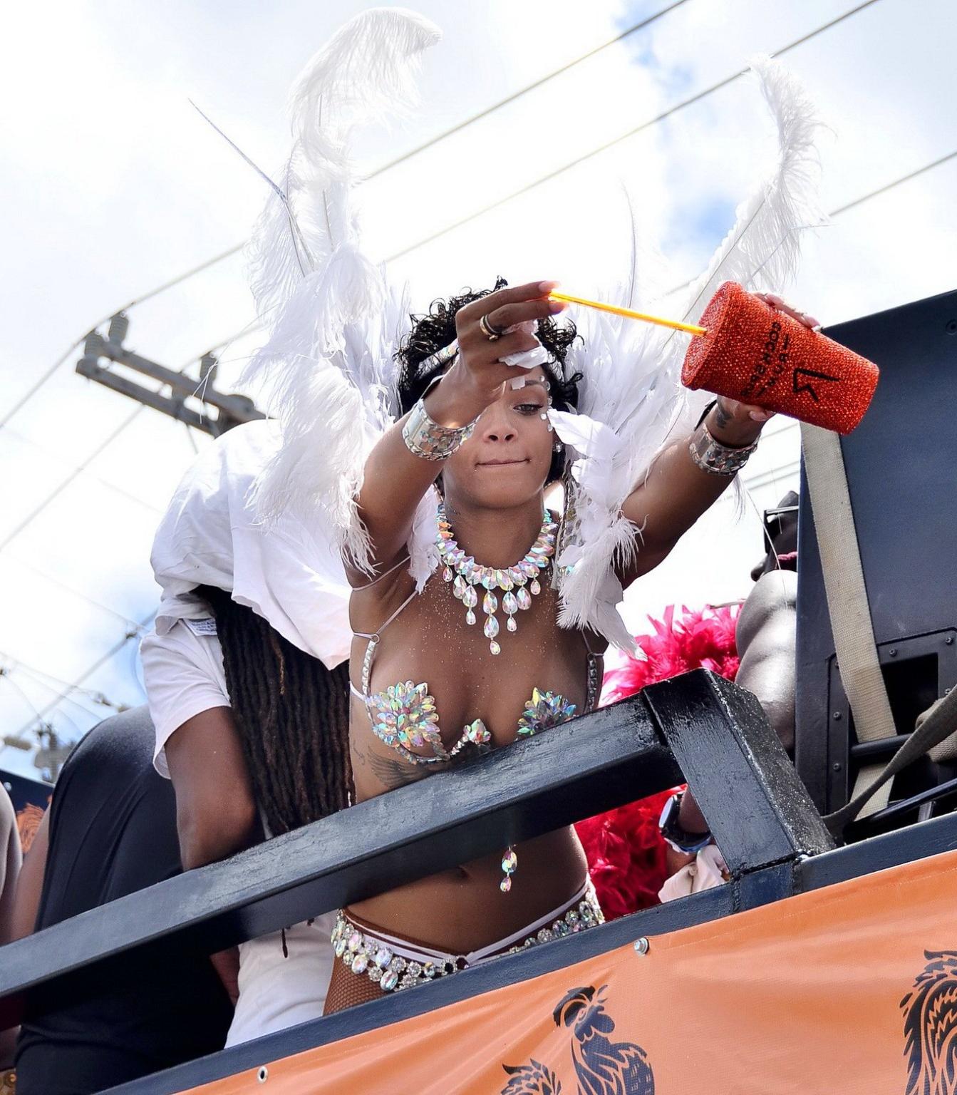 16P Rihanna wearing tiny carnival costume at Kadooment Day Parade in Barbados