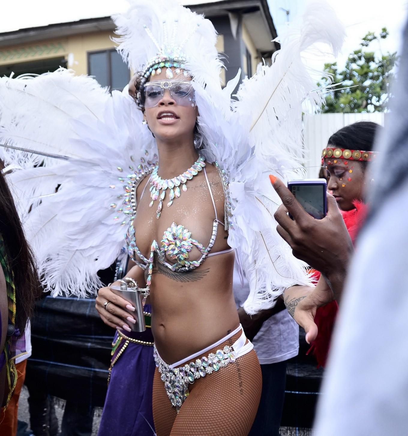 16P Rihanna wearing tiny carnival costume at Kadooment Day Parade in Barbados