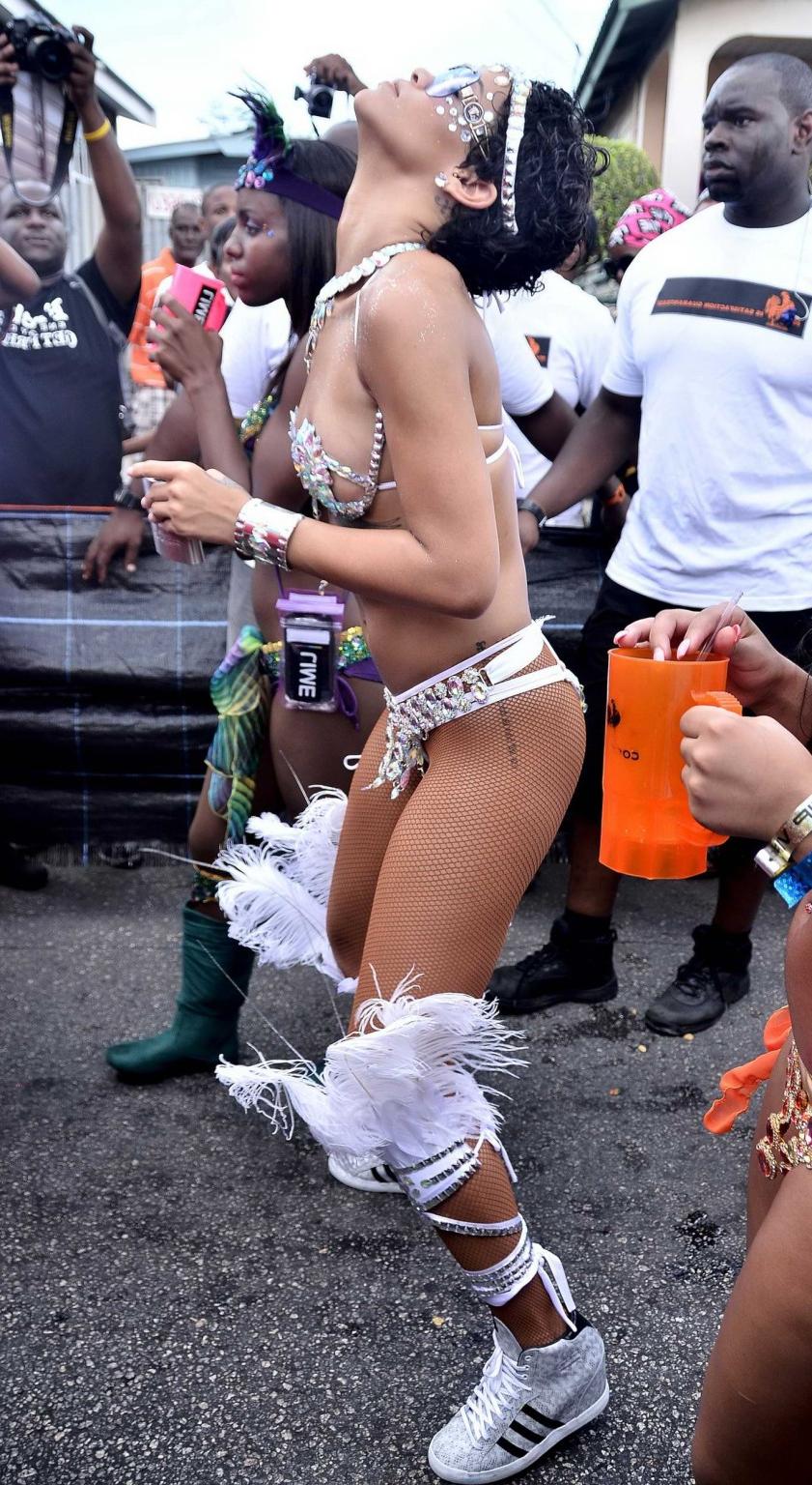 16P Rihanna wearing tiny carnival costume at Kadooment Day Parade in Barbados