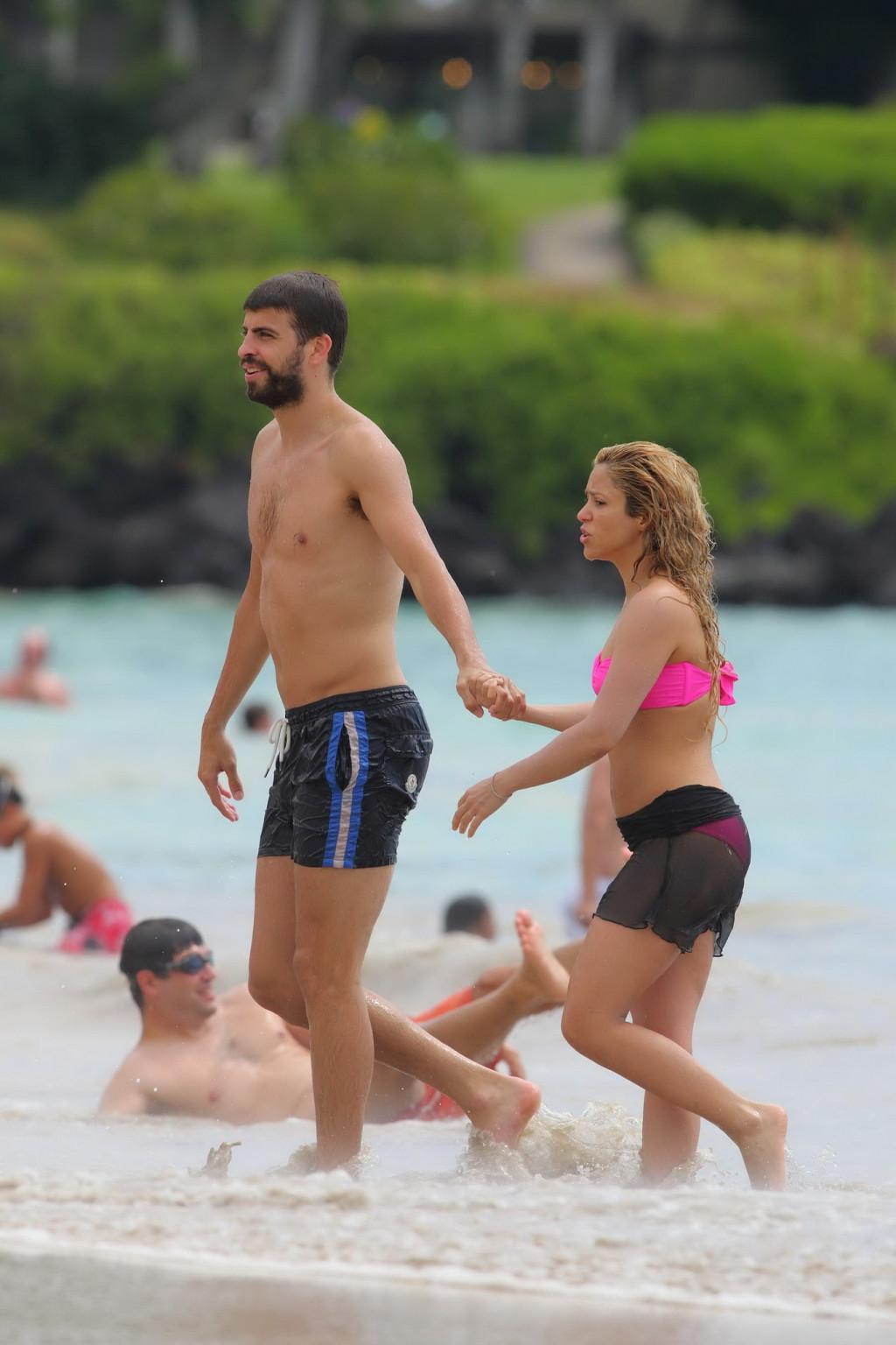 16P Shakira wearing two bikini sets at the beach while on vacation in Hawaii