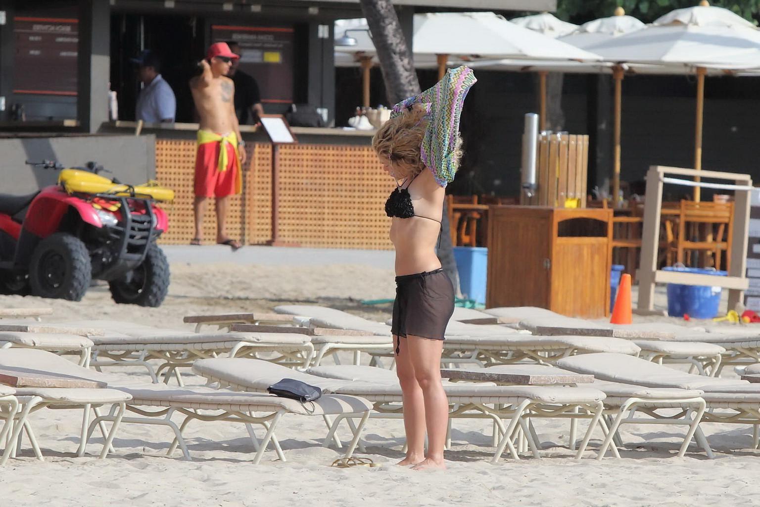 16P Shakira wearing two bikini sets at the beach while on vacation in Hawaii
