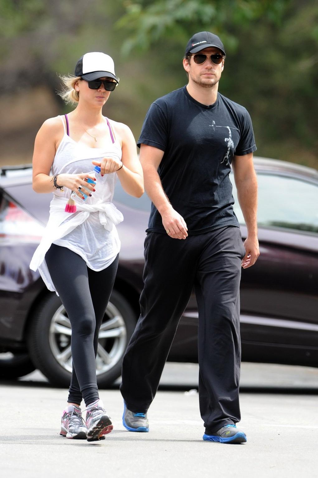 16P Kaley Cuoco wearing transparent tank top and tights while hiking on Hollywood Hi