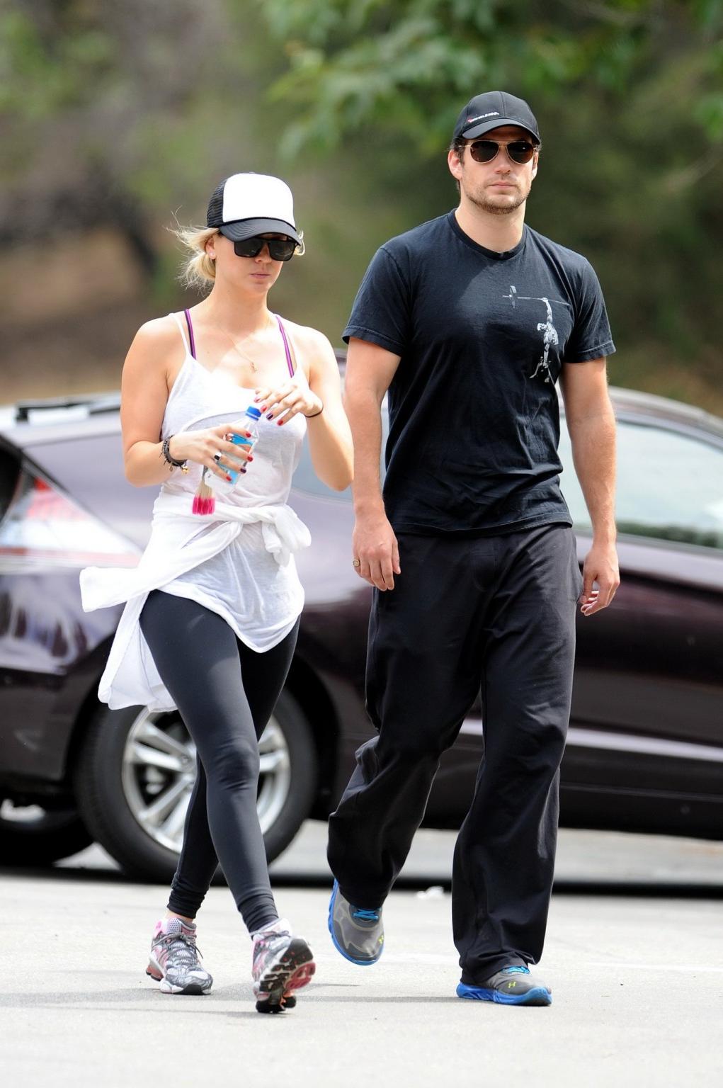 16P Kaley Cuoco wearing transparent tank top and tights while hiking on Hollywood Hi
