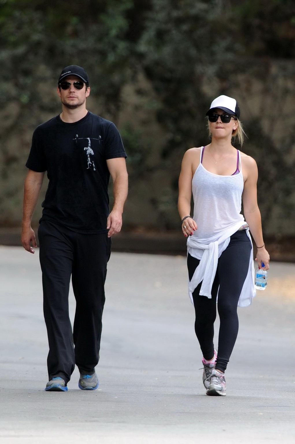 16P Kaley Cuoco wearing transparent tank top and tights while hiking on Hollywood Hi