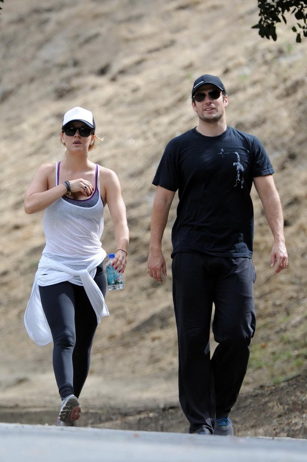 16P Kaley Cuoco wearing transparent tank top and tights while hiking on Hollywood Hi