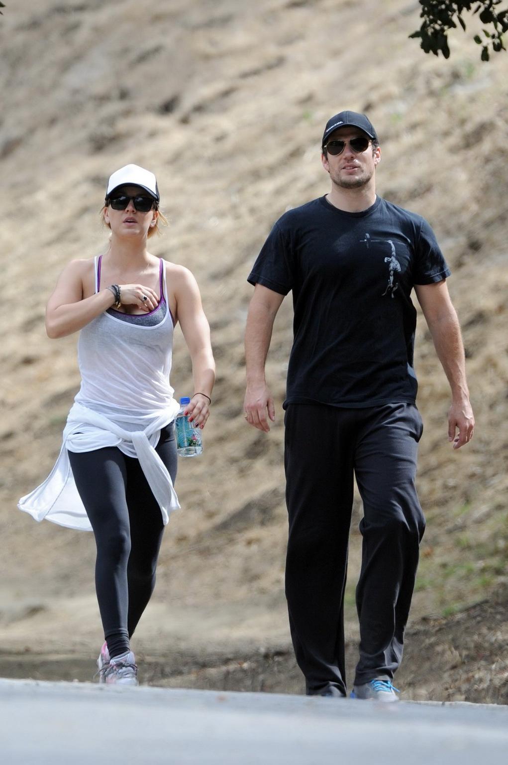 16P Kaley Cuoco wearing transparent tank top and tights while hiking on Hollywood Hi