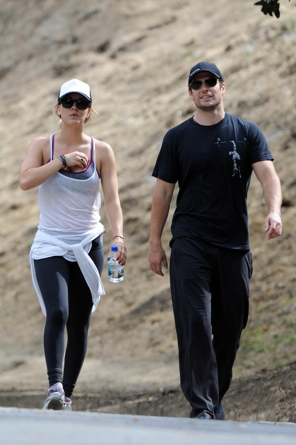16P Kaley Cuoco wearing transparent tank top and tights while hiking on Hollywood Hi