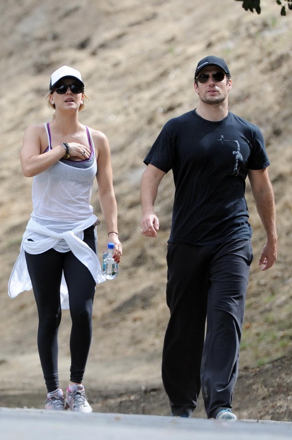 16P Kaley Cuoco wearing transparent tank top and tights while hiking on Hollywood Hi