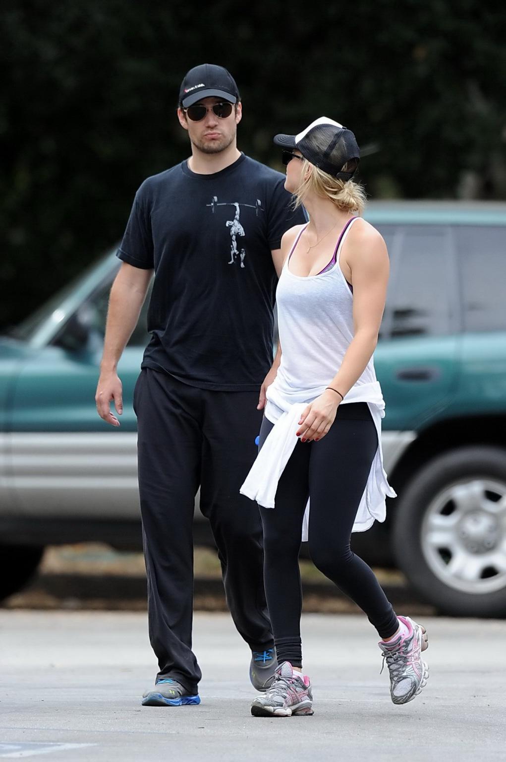 16P Kaley Cuoco wearing transparent tank top and tights while hiking on Hollywood Hi