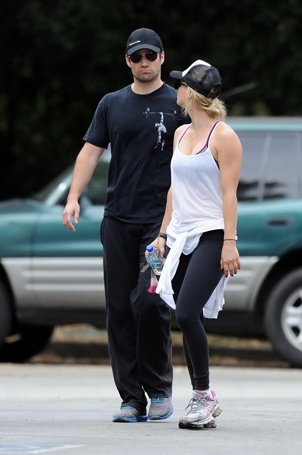 16P Kaley Cuoco wearing transparent tank top and tights while hiking on Hollywood Hi