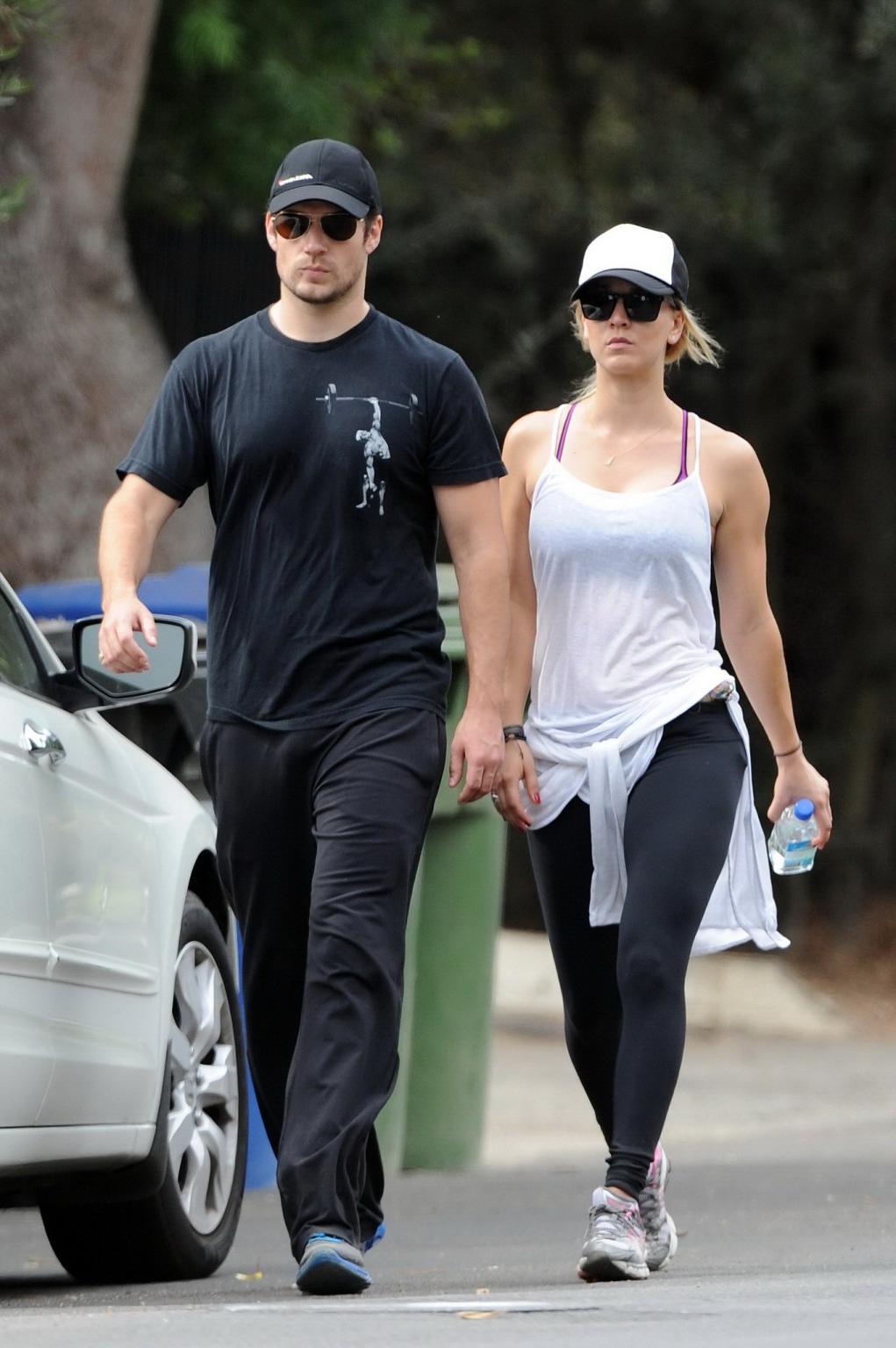 16P Kaley Cuoco wearing transparent tank top and tights while hiking on Hollywood Hi