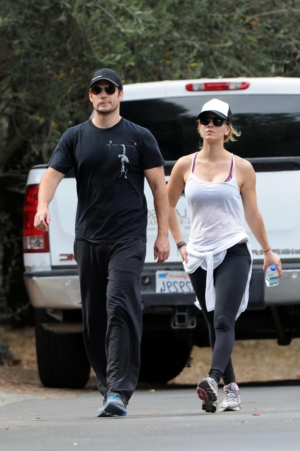 16P Kaley Cuoco wearing transparent tank top and tights while hiking on Hollywood Hi