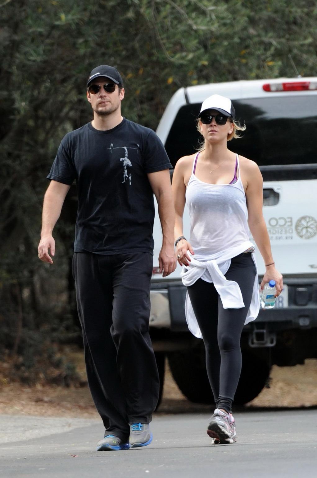 16P Kaley Cuoco wearing transparent tank top and tights while hiking on Hollywood Hi