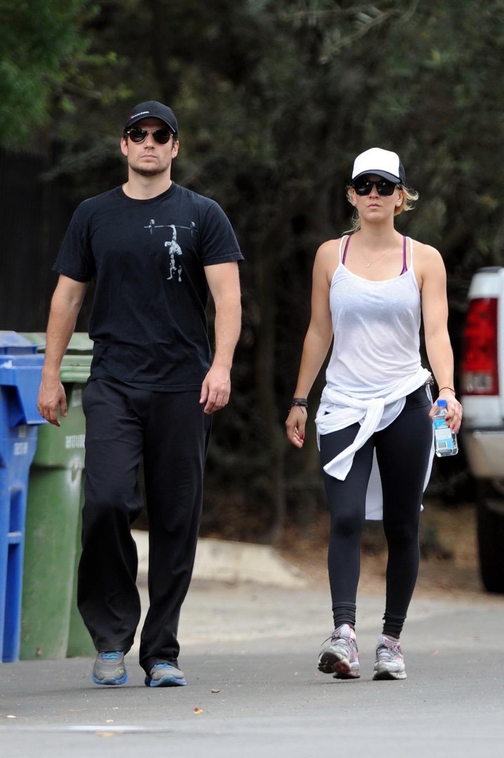 16P Kaley Cuoco wearing transparent tank top and tights while hiking on Hollywood Hi