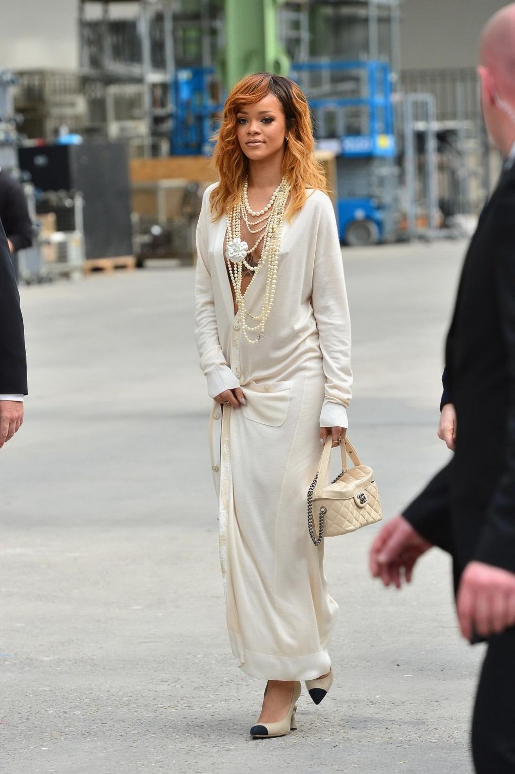 16P Rihanna posing naked under a wide open see-through cardigan for Chanel at Paris 