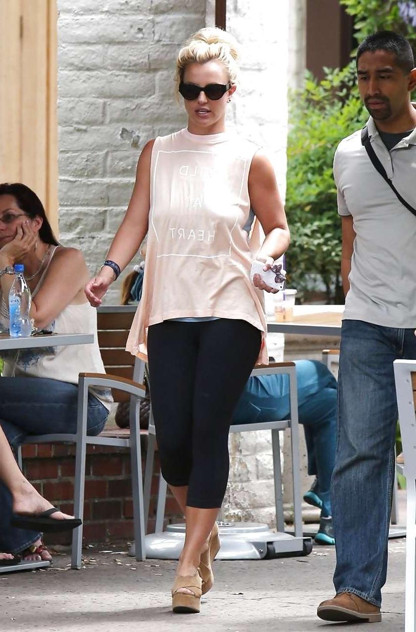 16P Britney Spears showing boobs in see thru shirt on street
