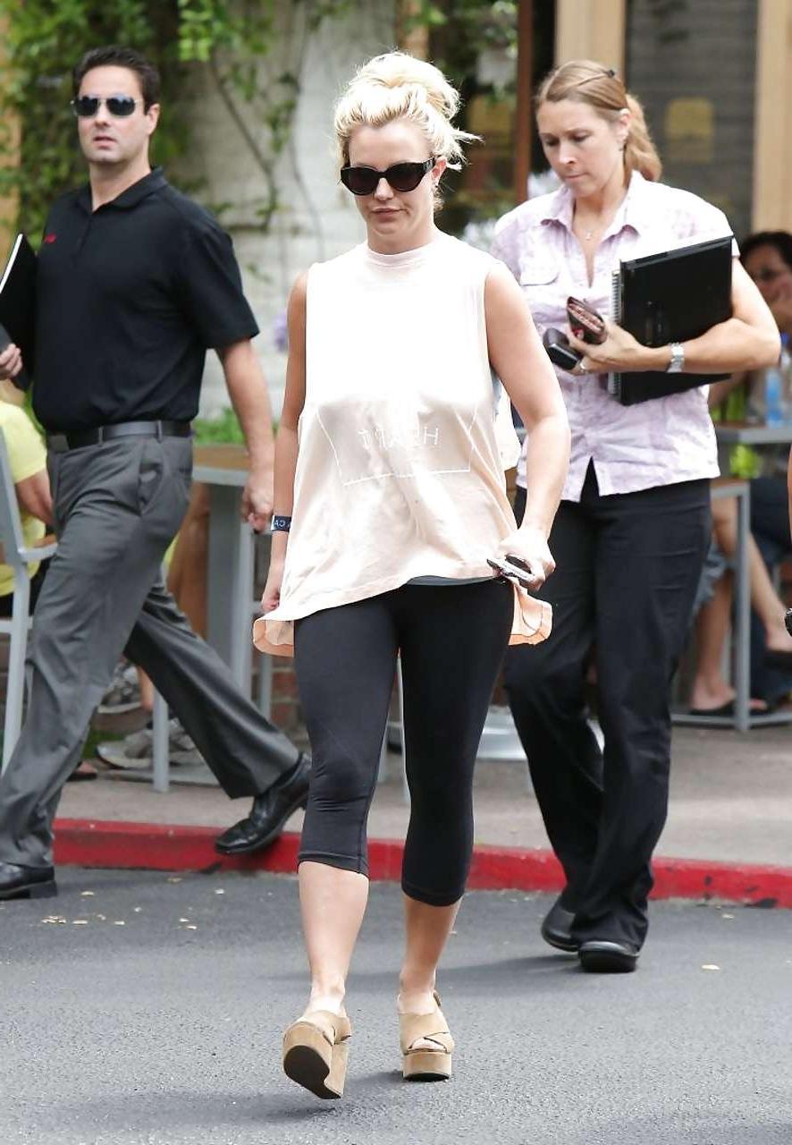 16P Britney Spears showing boobs in see thru shirt on street