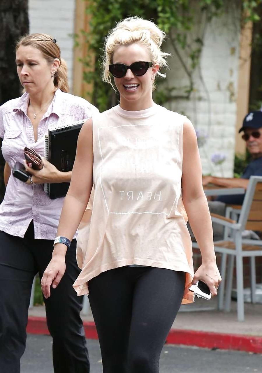 16P Britney Spears showing boobs in see thru shirt on street