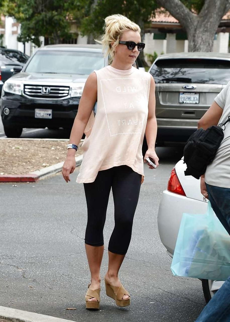 16P Britney Spears showing boobs in see thru shirt on street