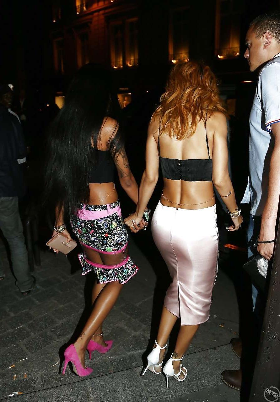 16P Rihanna exposing huge cleavage and long legs in evening dress