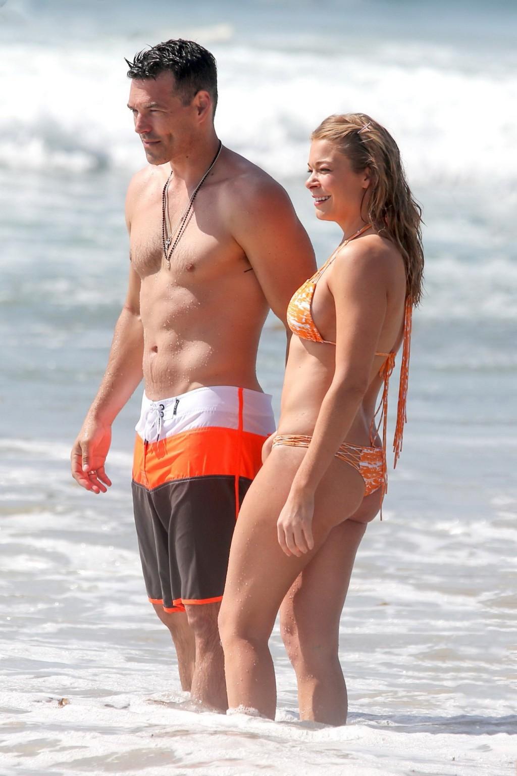 16P LeAnn Rimes wearing tiny orange bikini at the beach in Los Angeles